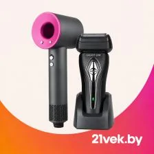 Фен для волос и электробритва Galaxy Line на светлом фоне.